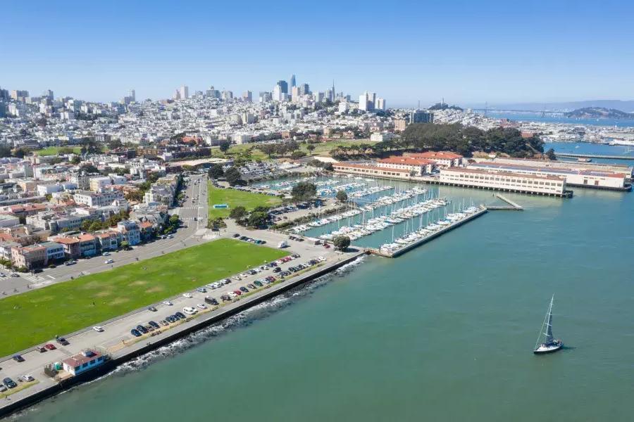 Aerial of Fort Mason with the San Francisco skyline in the distance.